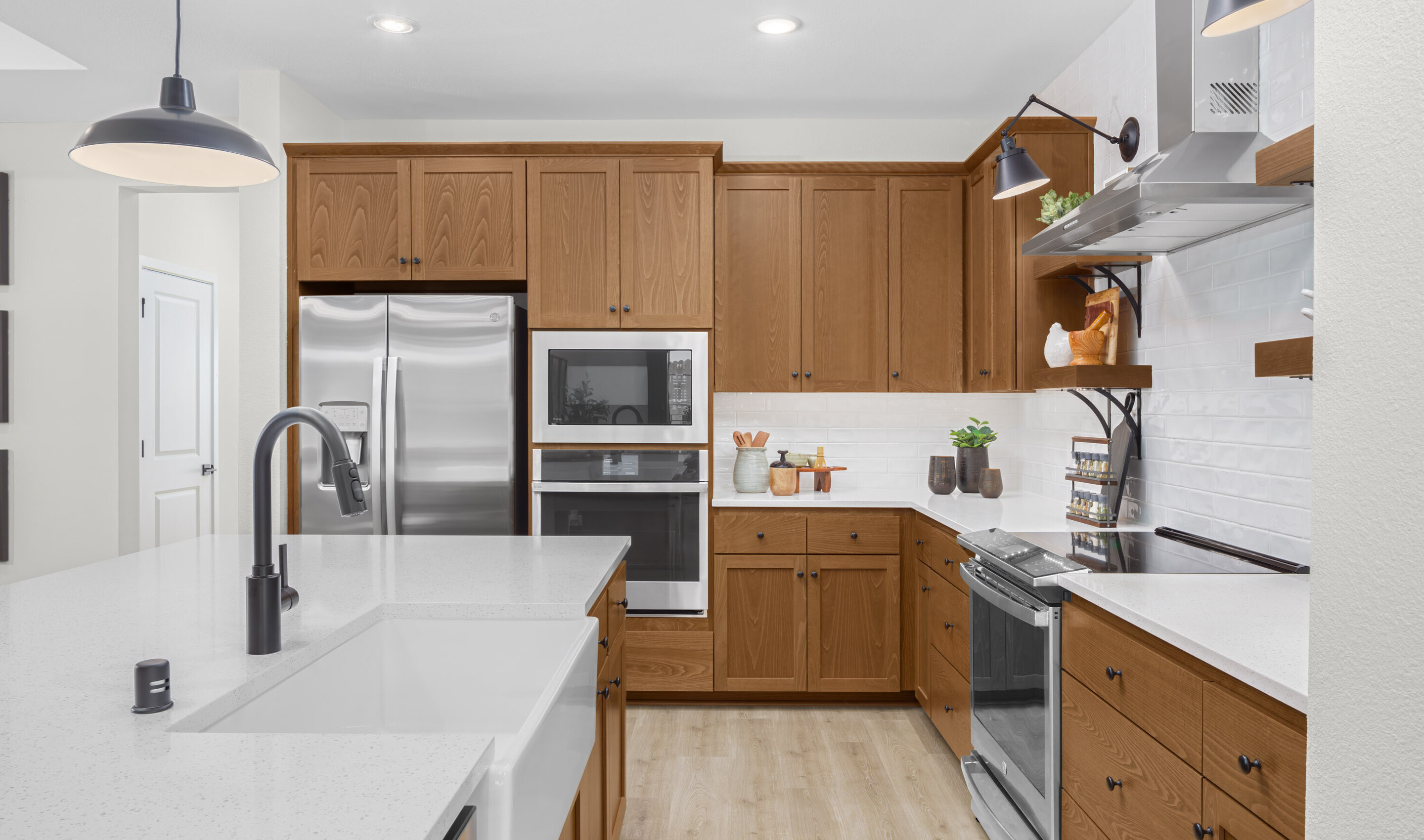 Kitchen with white apron-front sink 