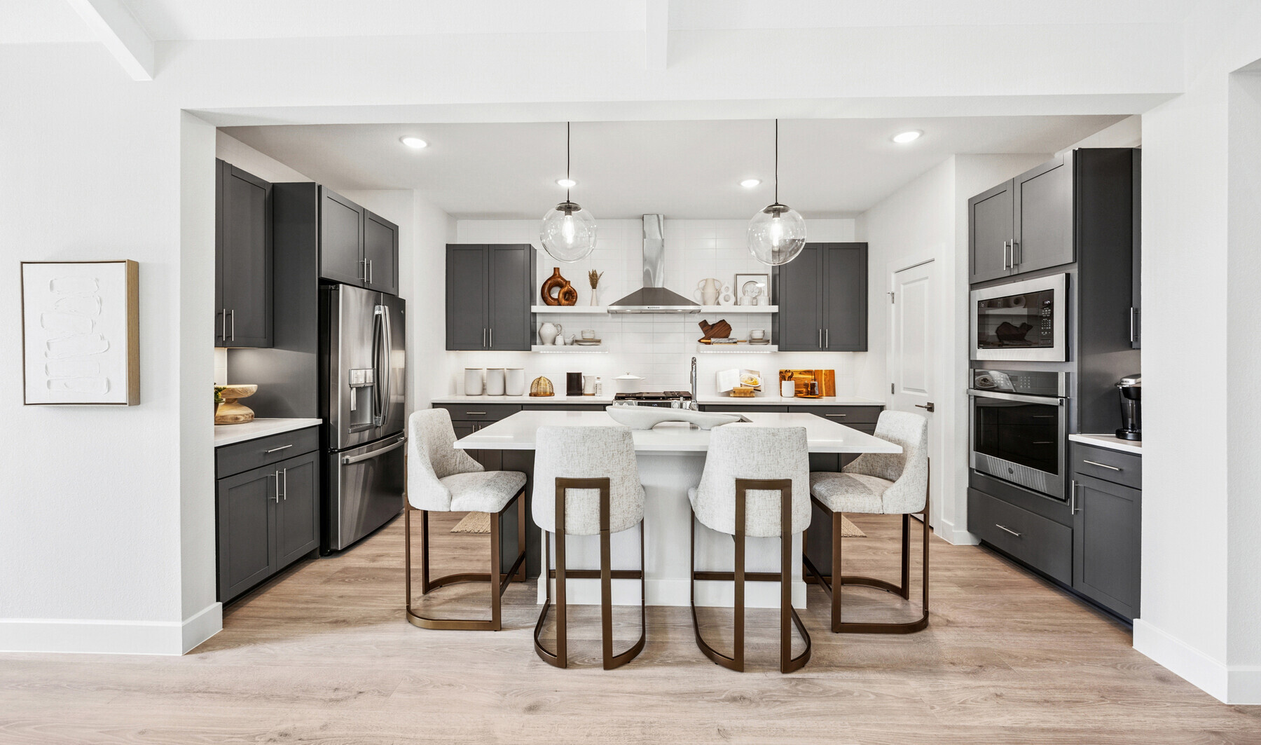 Kitchen with vast island & pendant lights
