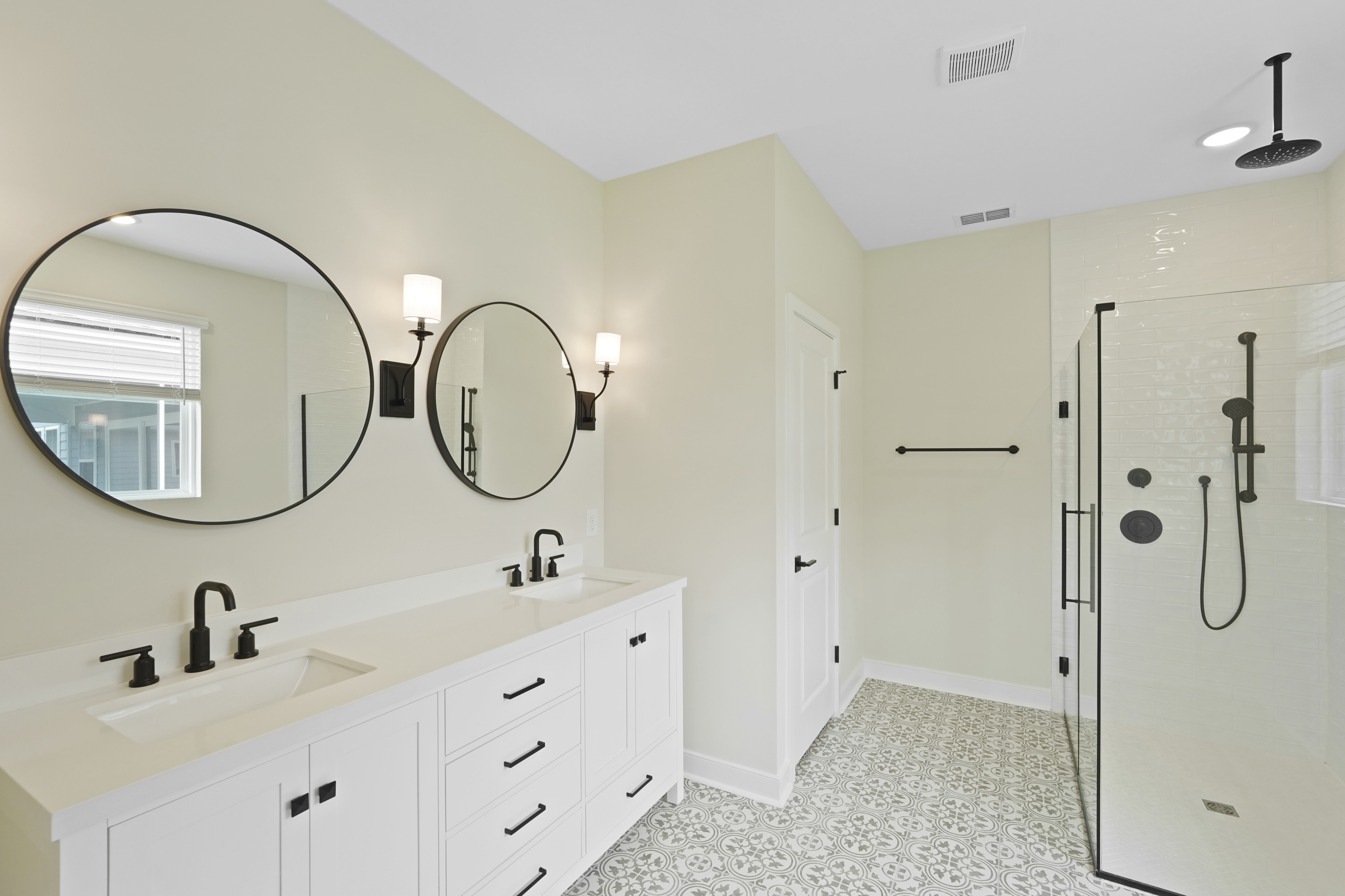 Primary bath with matte black finishes