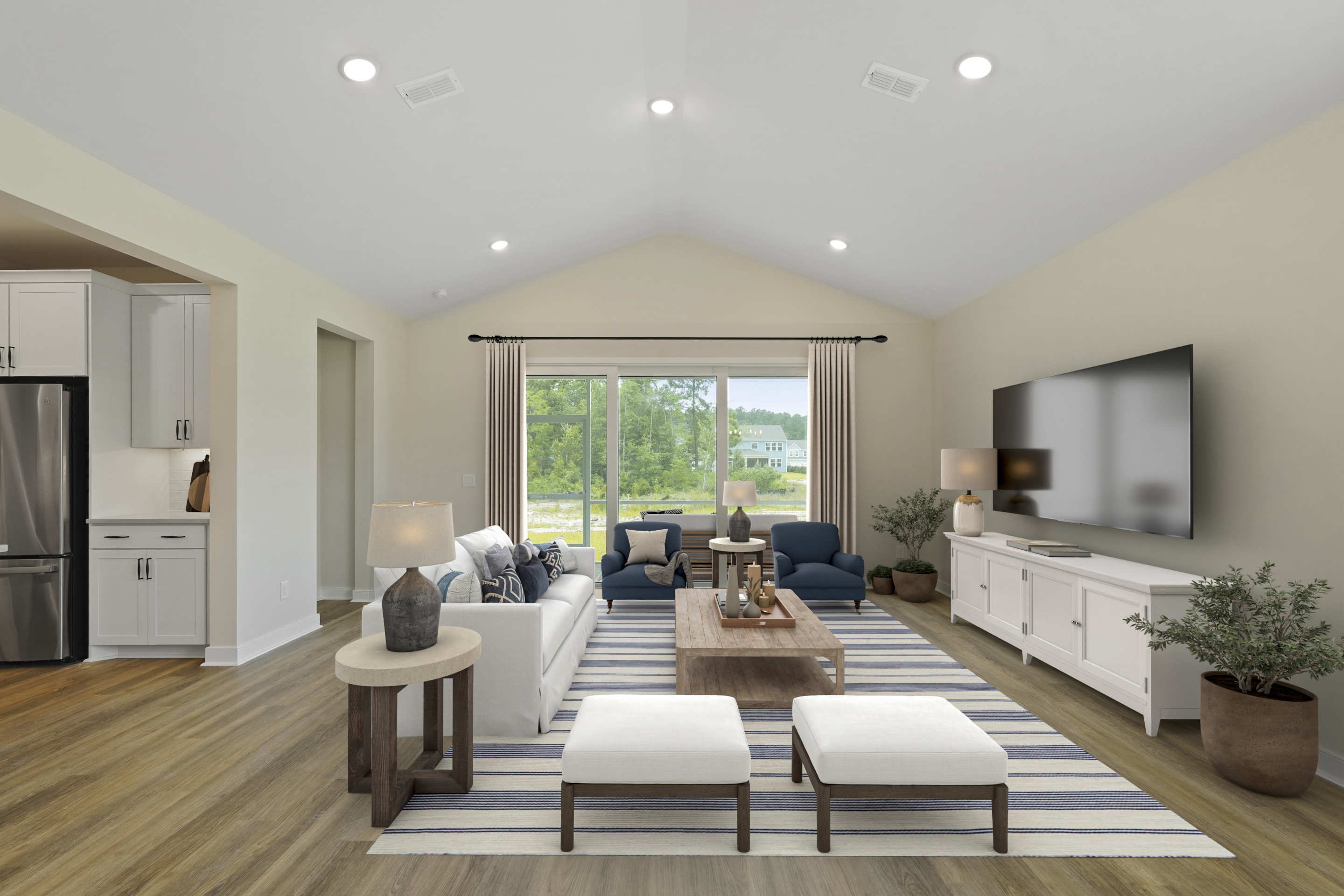 Great room featuring vaulted ceiling