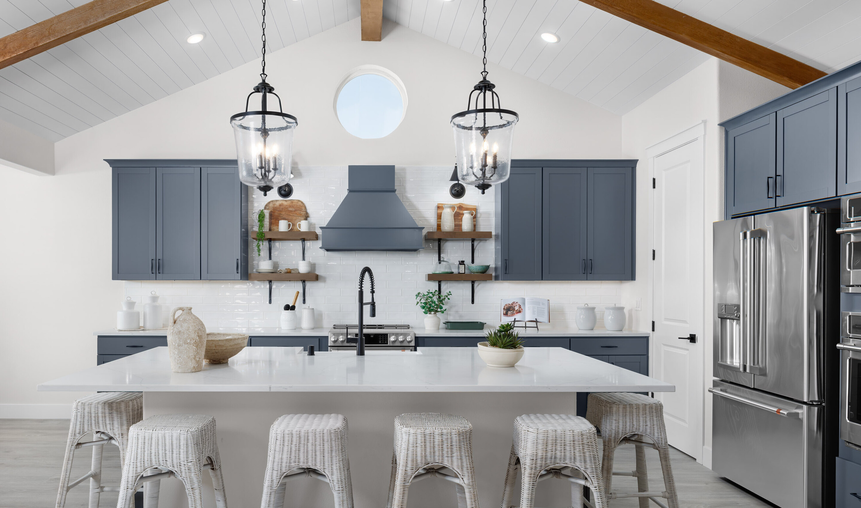 Kitchen with pendant lighting and floating shelves
