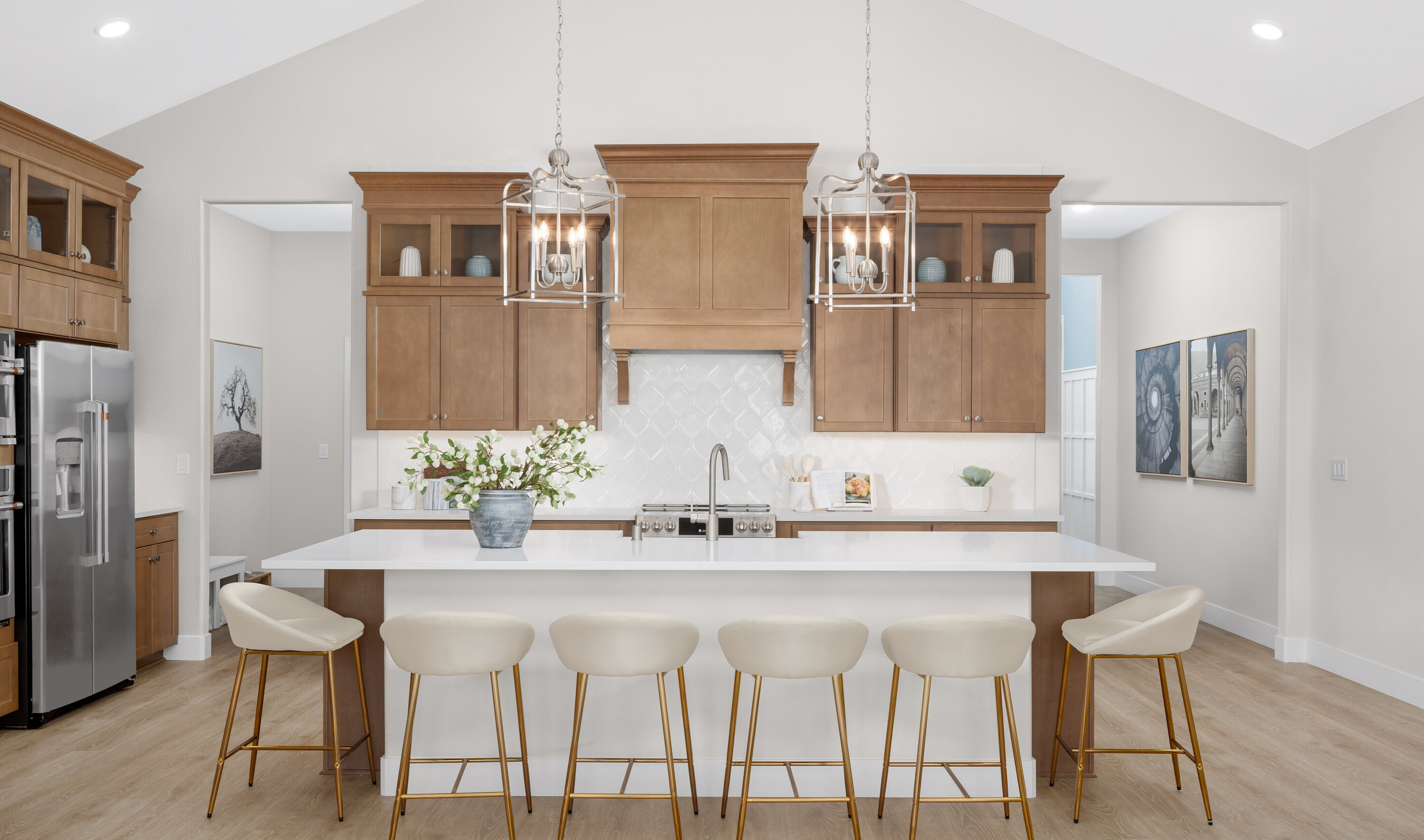 Kitchen with pendant lighting and glass upper cabinets