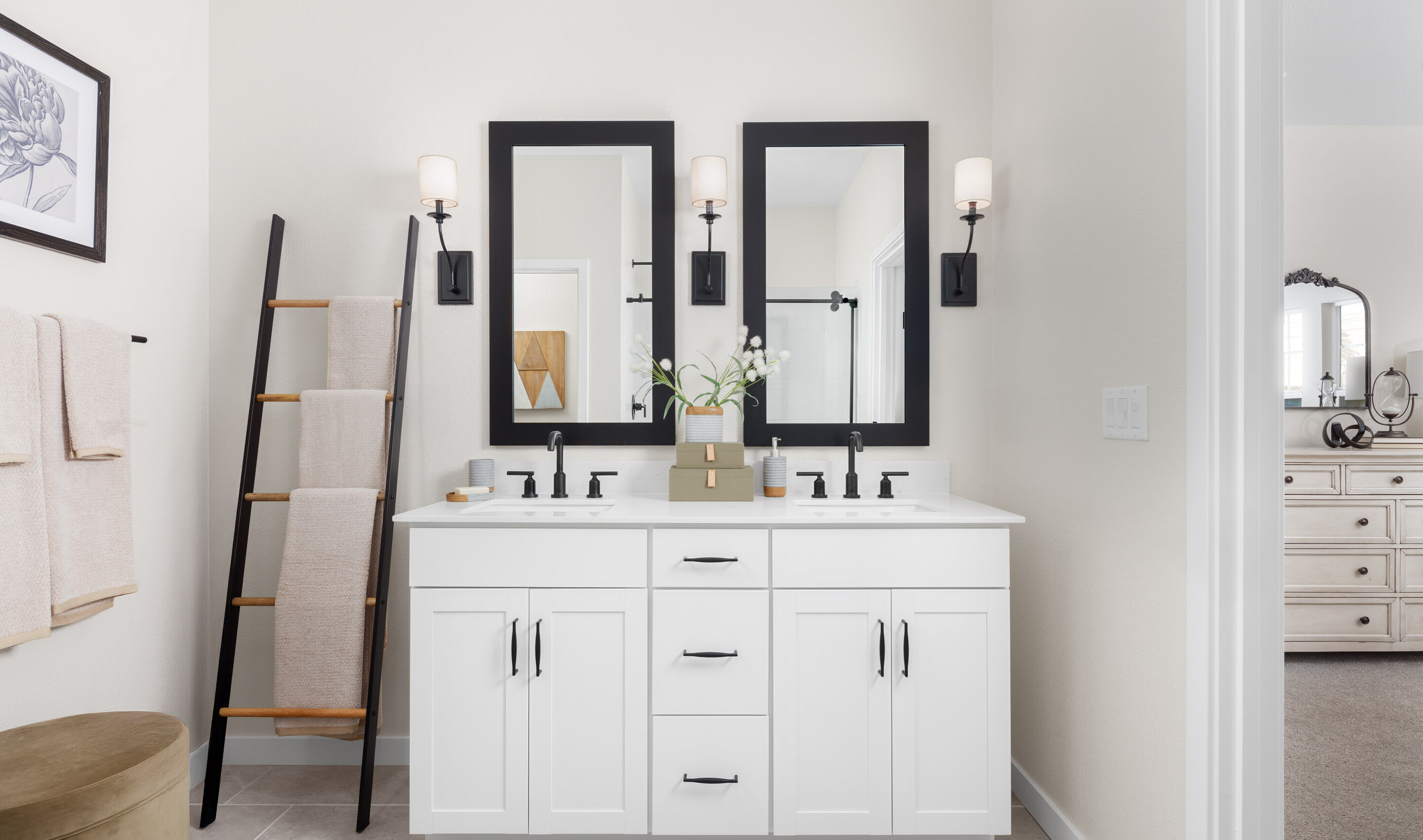 Primary bath features vanity with dual sinks